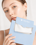 Patting face dry with a clean DrySee towel